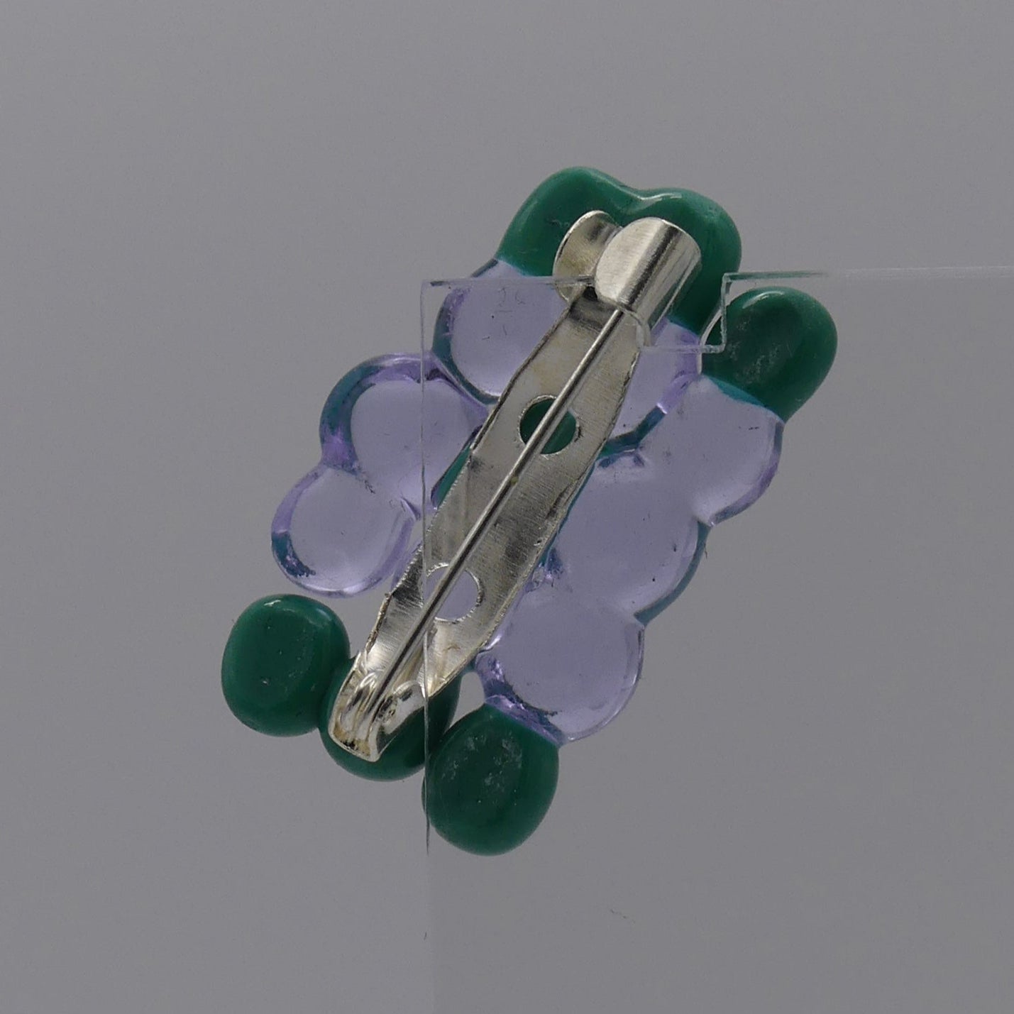 Broche vert violet