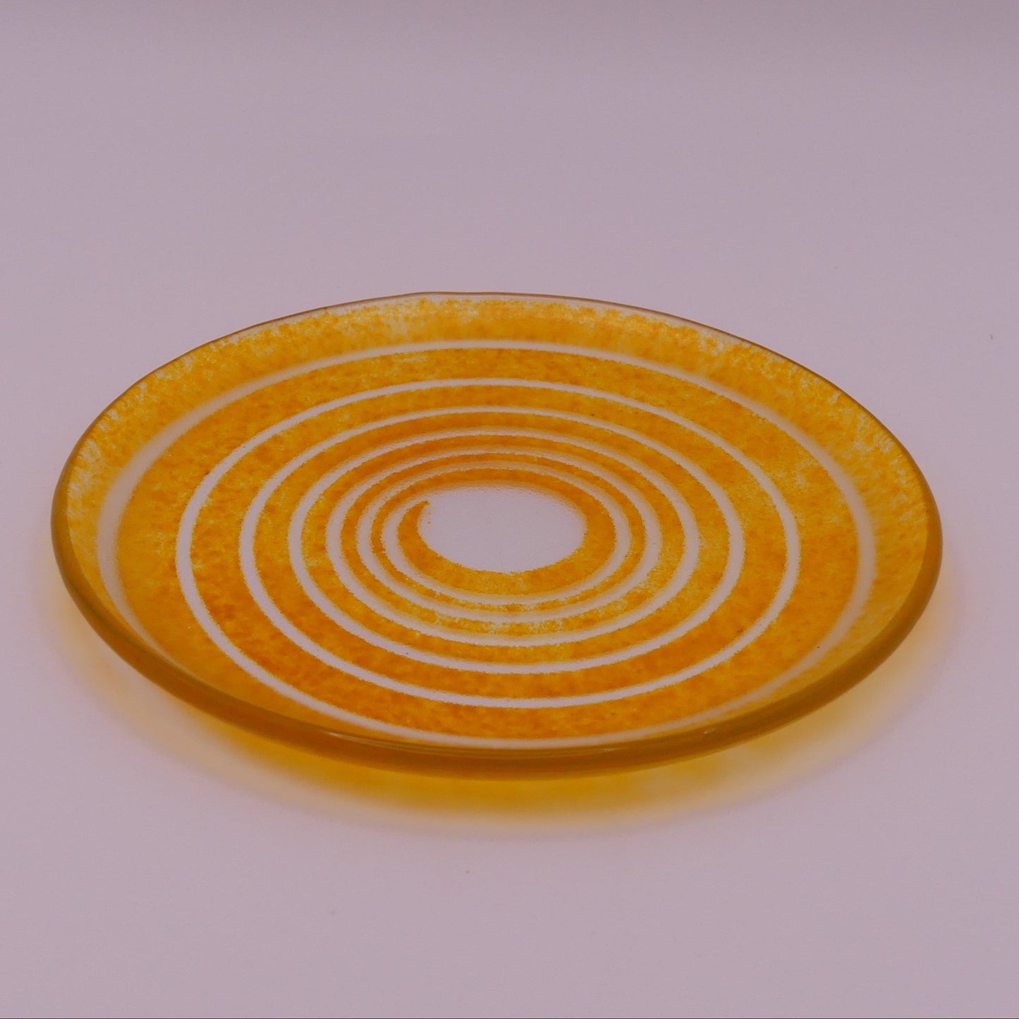 Assiette à thé spirale orange