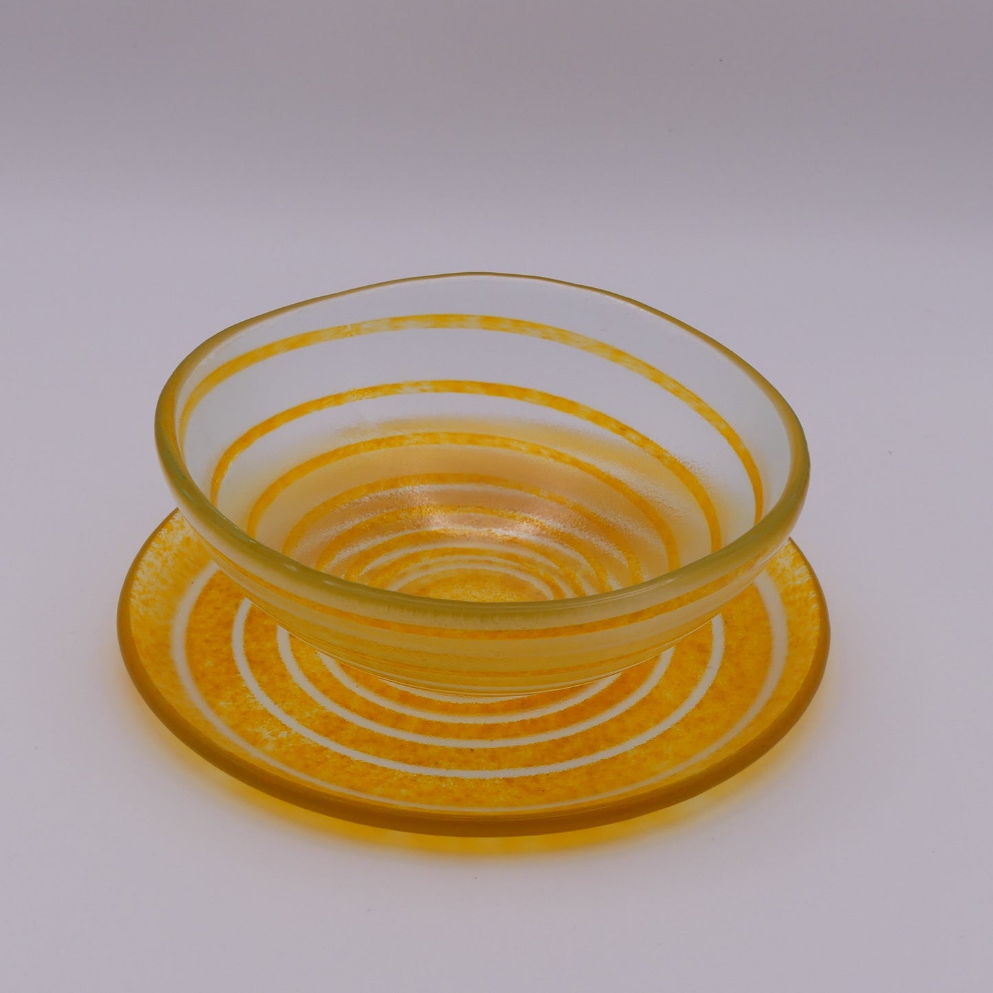 Assiette à thé spirale orange