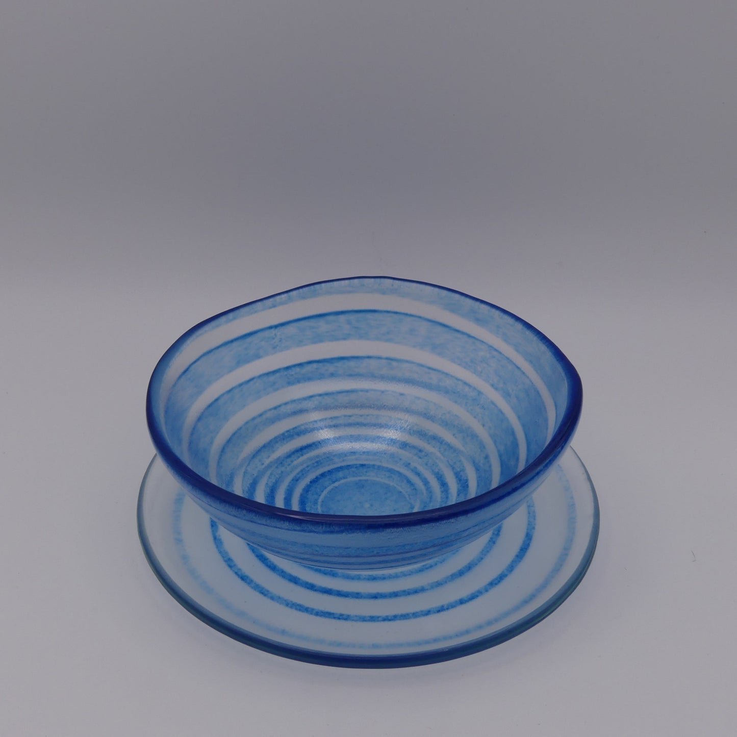 Assiette à thé spirale transparente bleu