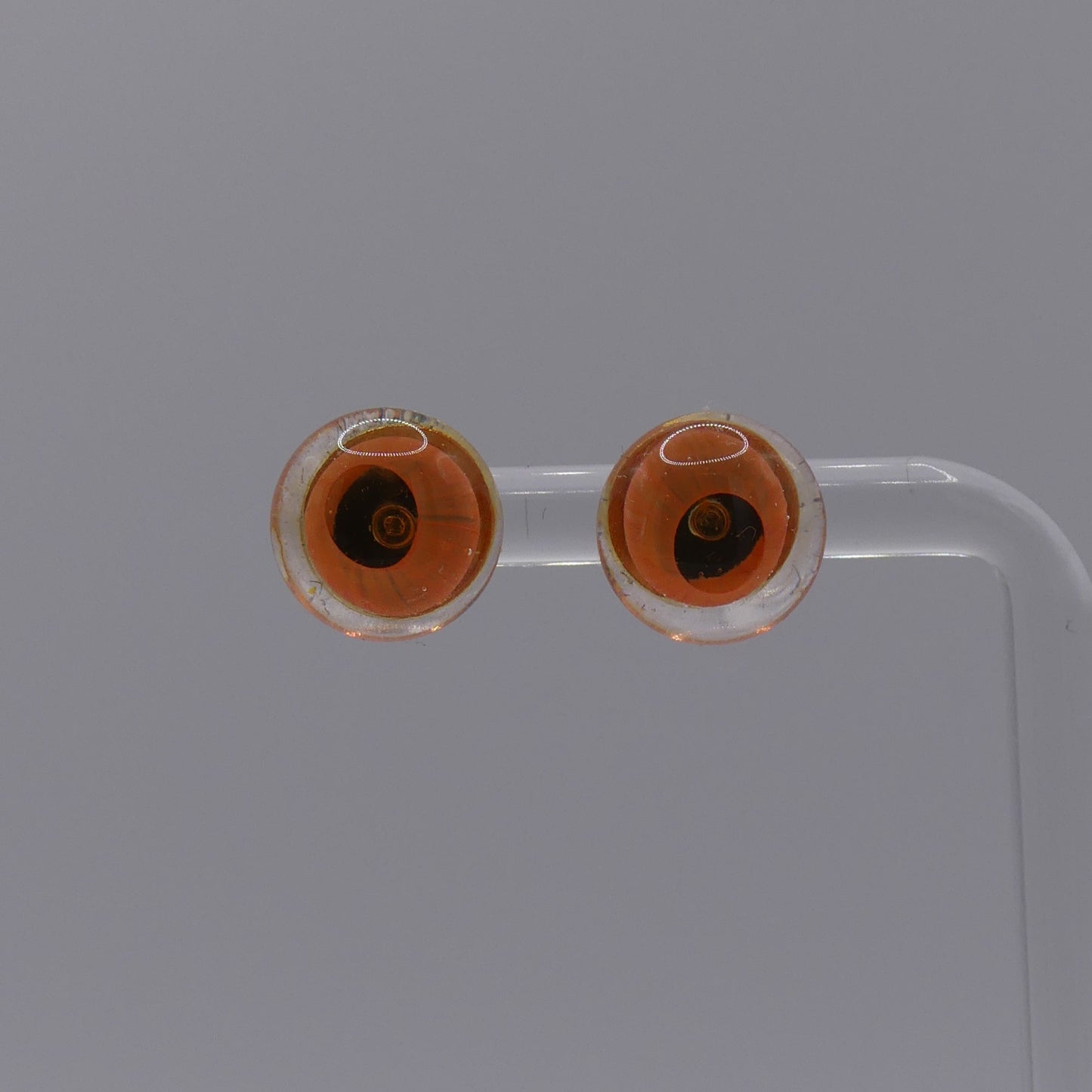 Clous d'oreilles orange