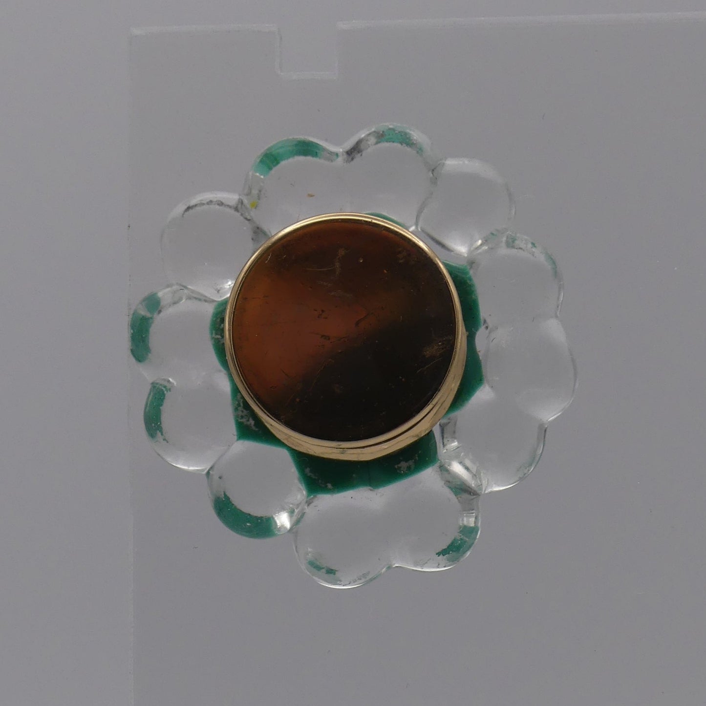 Broche vert transparent