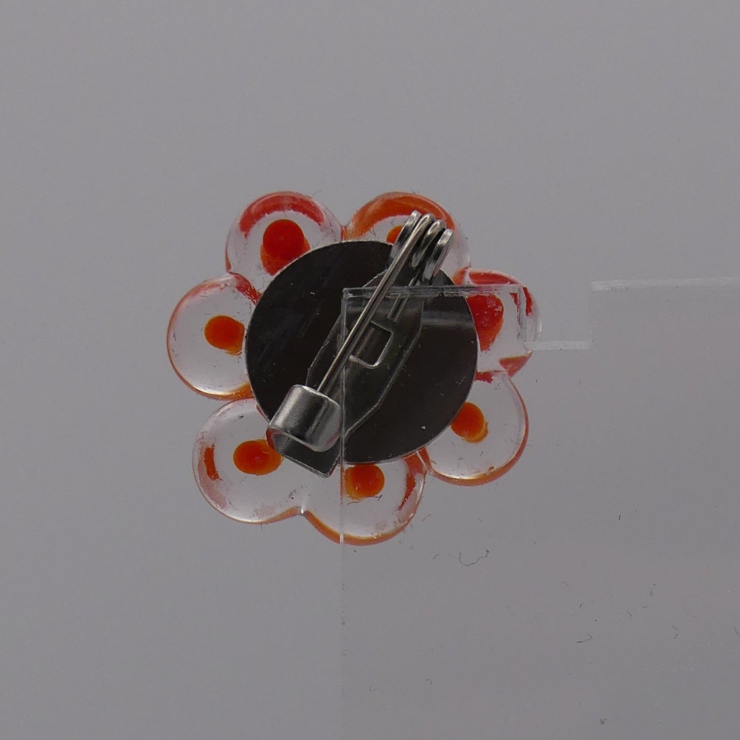 Broche orange
