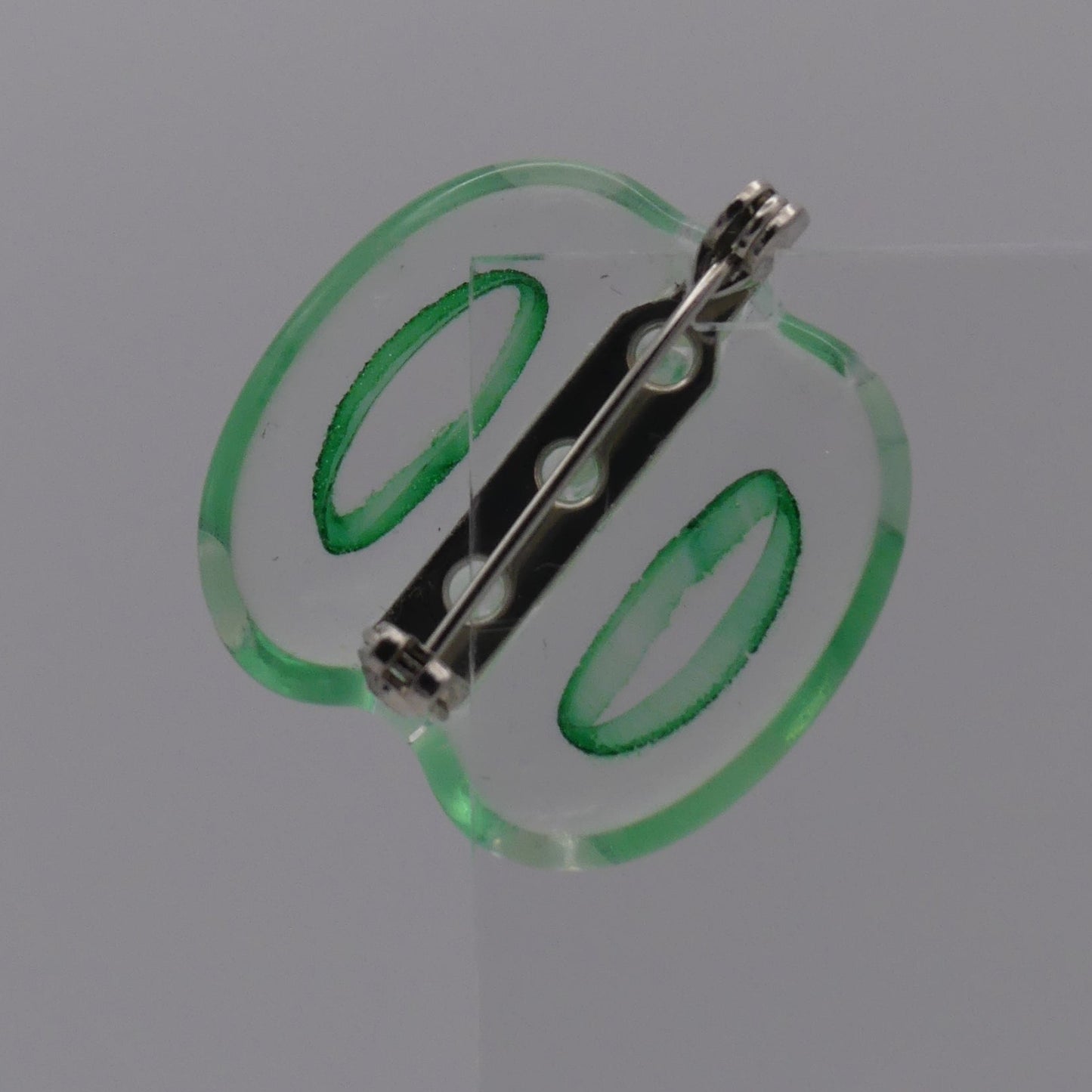 Broche transparent vert