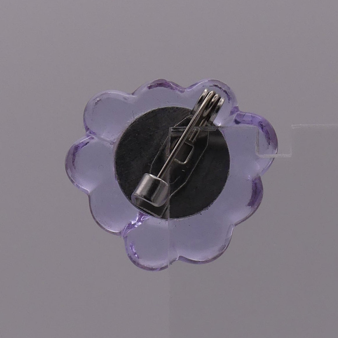 Broche violet transparent