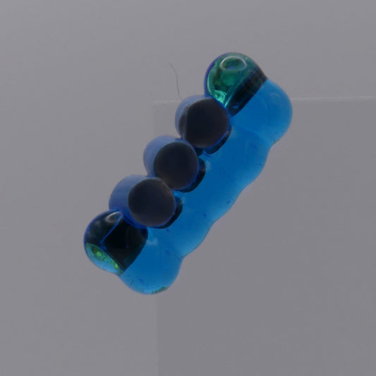 Broche bleu