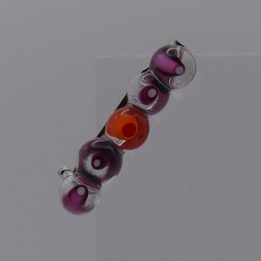 Broche rose orange