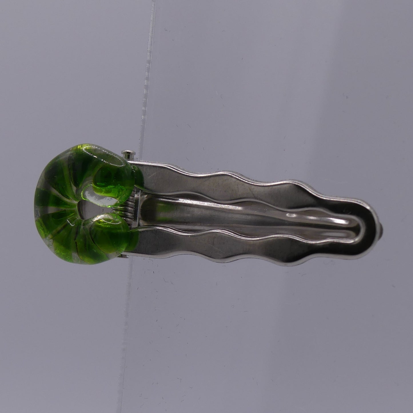 Pince à cheveux vert