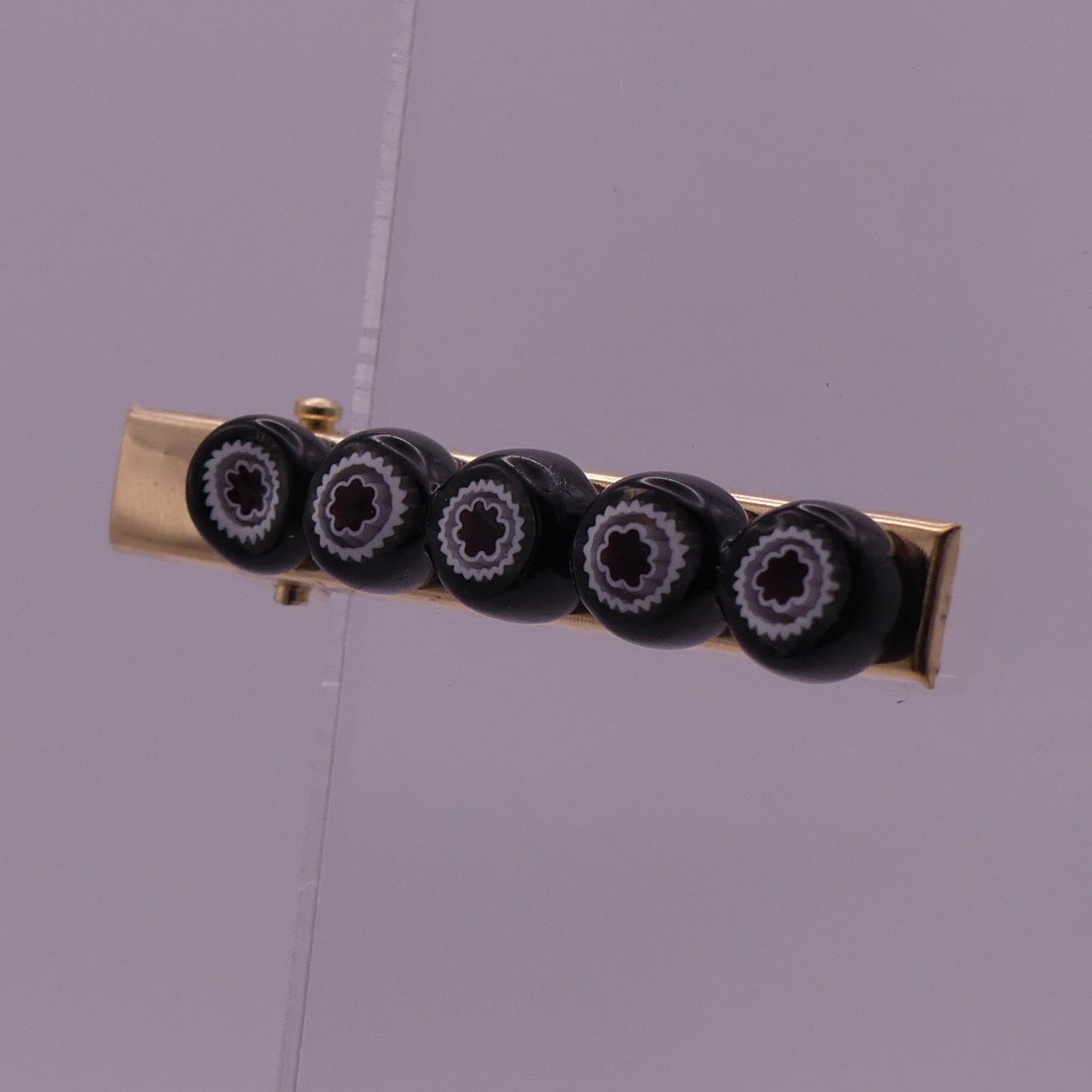 Pince à cheveux noir motifs