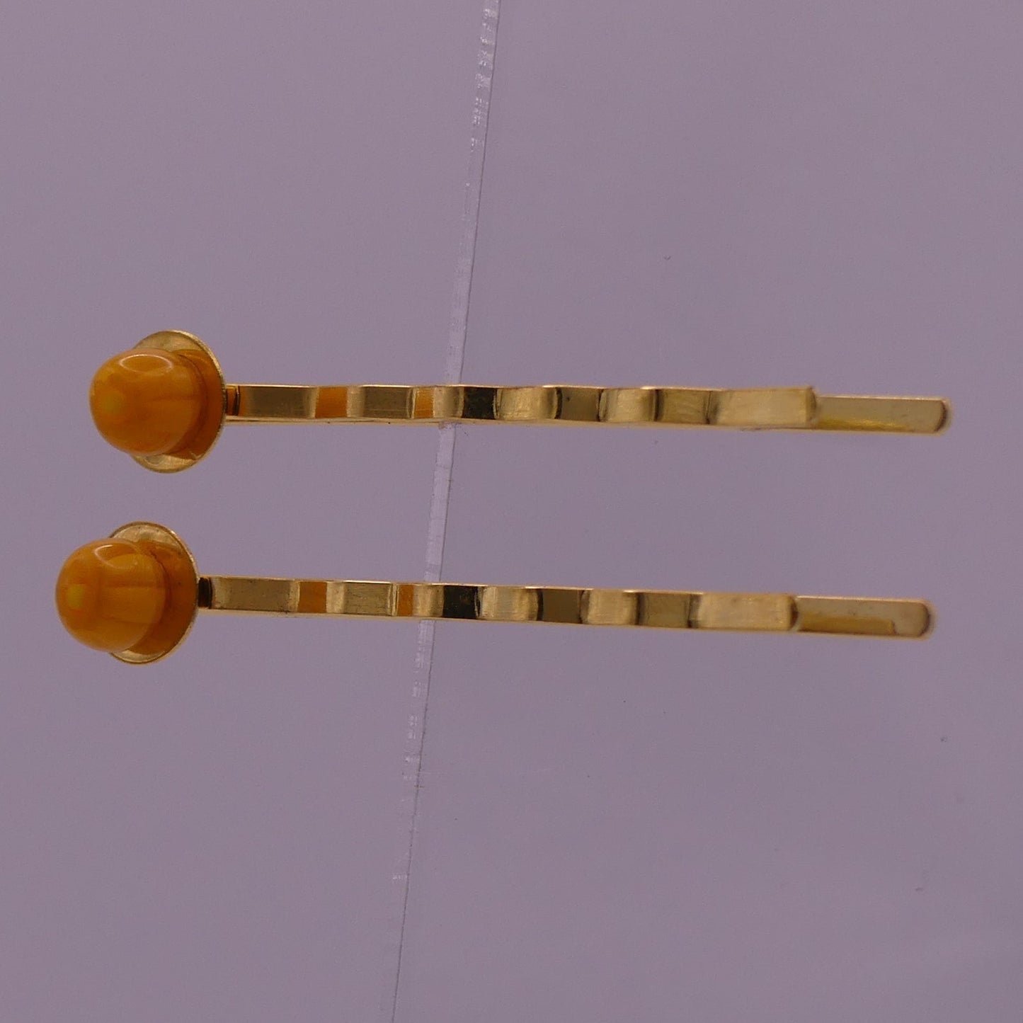 Pinces à cheveux jaune