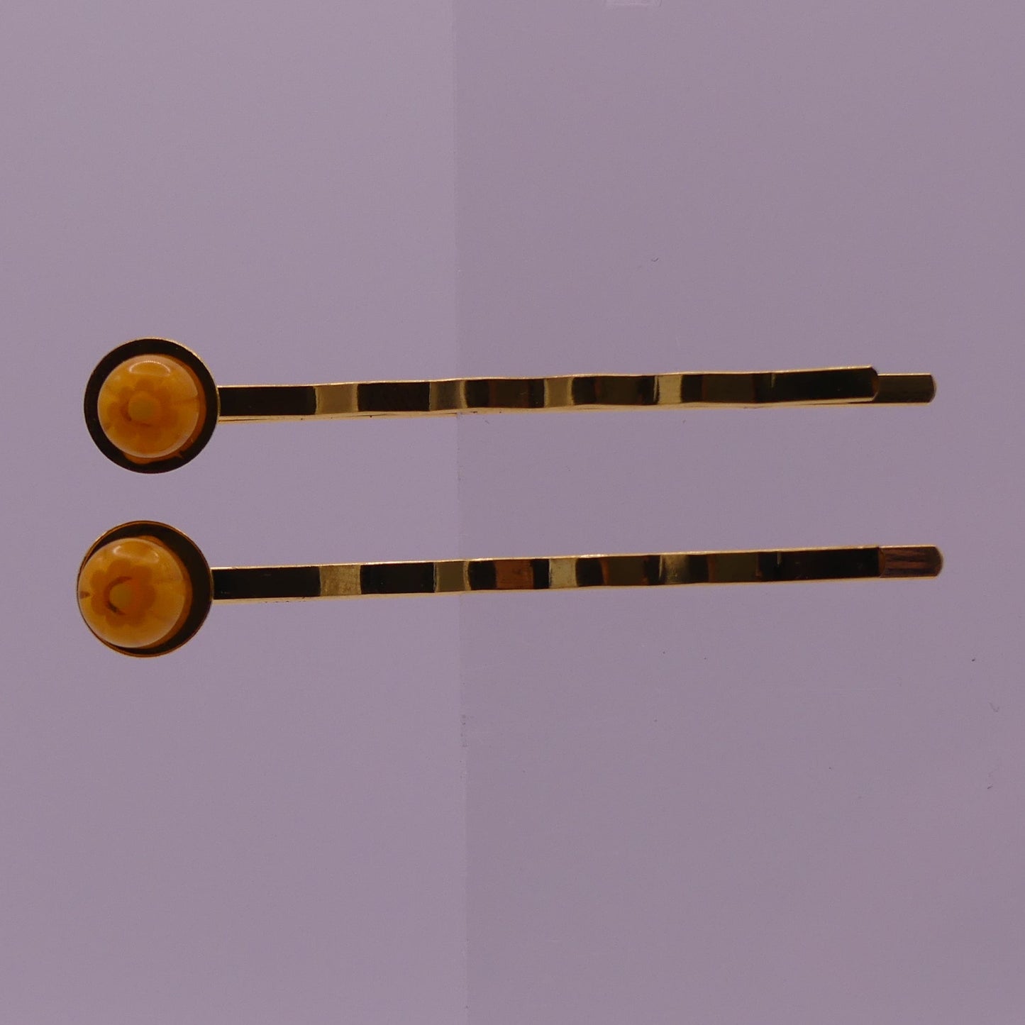 Pinces à cheveux jaune