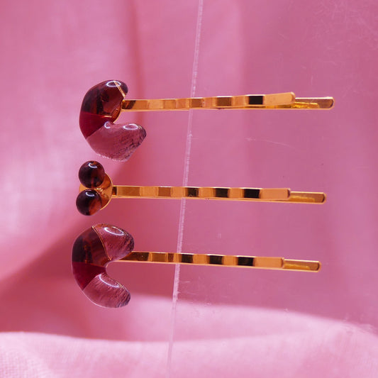 Pinces à cheveux prune