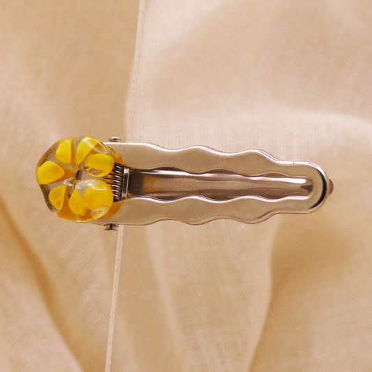 Pince à cheveux jaune