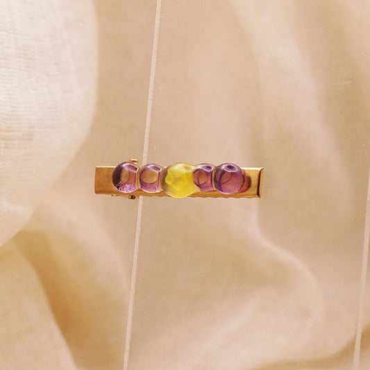 Pince à cheveux violette jaune